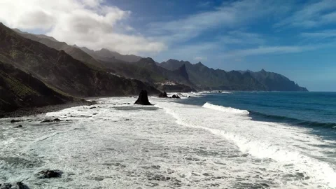 Aerial view of ocean waves crashing against rocks, Roque de las Bodegas Stock Footage 336453479