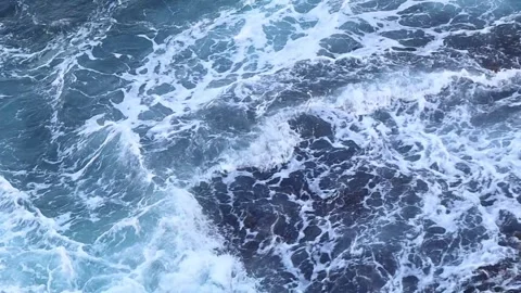 Aerial View of Ocean Waves Crashing on Rocks at Pangandaran Beach Indonesia Stock Footage 342033250