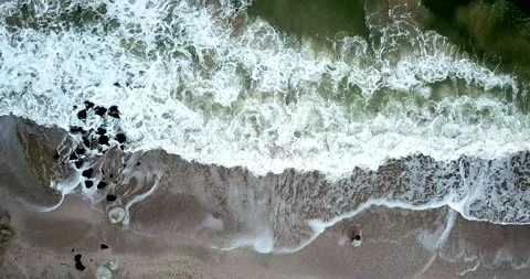 Aerial view of ocean waves creating white foam. 4k video Stock Footage 136612079