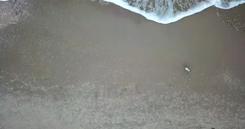 Aerial view of ocean waves creating white foam. 4k video Stock Footage 136612467