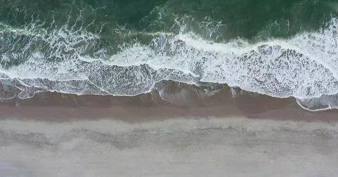 Aerial view of Ocean Waves Creating Mesmerizing Water Patterns Stock Photos