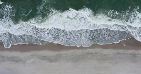Aerial view of Ocean Waves Creating Mesmerizing Water Patterns Stock Photos