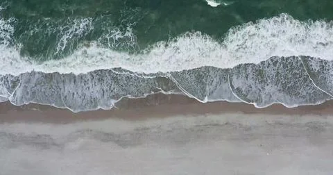 Aerial view of Ocean Waves Creating Mesmerizing Water Patterns Stock Photos