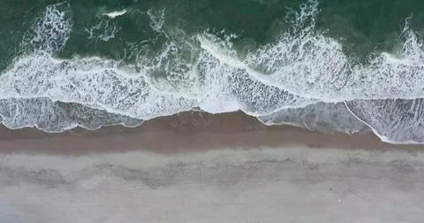 Aerial view of Ocean Waves Creating Mesmerizing Water Patterns Stock Photos