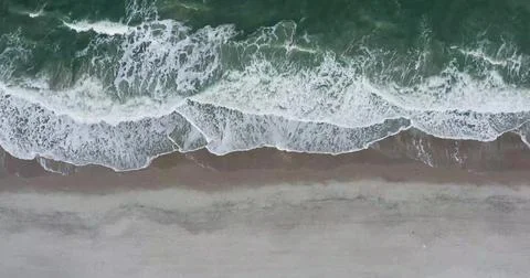 Aerial view of Ocean Waves Creating Mesmerizing Water Patterns Stock Photos
