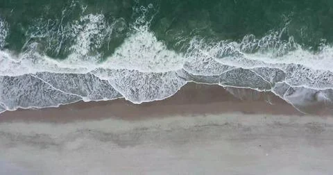 Aerial view of Ocean Waves Creating Mesmerizing Water Patterns Stock Photos
