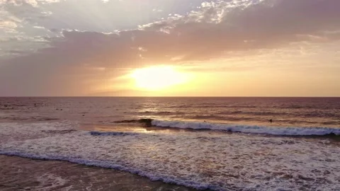 Aerial view of ocean waves crushing. Yellow sky with waves coming from Atlantic  Stock Footage 207818455