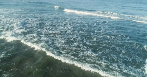 Aerial view of ocean waves rolling The Concept of tranquility Stock Footage 336544323