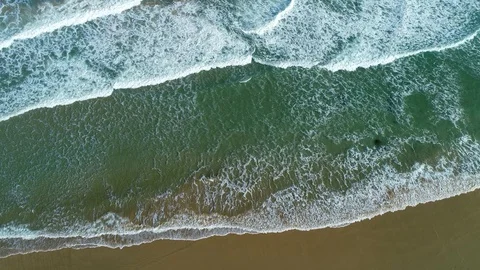 Aerial view of ocean waves on sandy beach, southern Africa Stock Footage 128618472