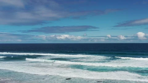 Aerial View of Ocean Waves on a Sandy Beach Stock Footage 320727949