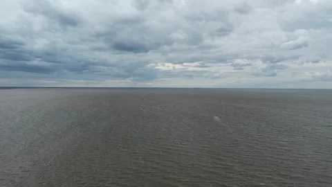 Aerial view of Ocean Waves at Snettisham Beach UK 動画素材 316297853