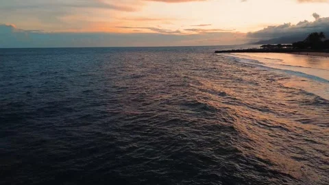 Aerial view of ocean waves at sunset Stock-Footage 277861276