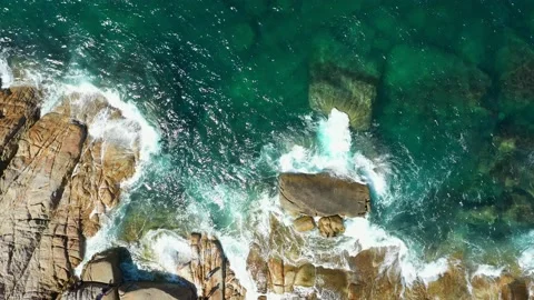 Aerial view of the ocean waves, white beaches and clear blue water and beautiful Stock Footage 130661185
