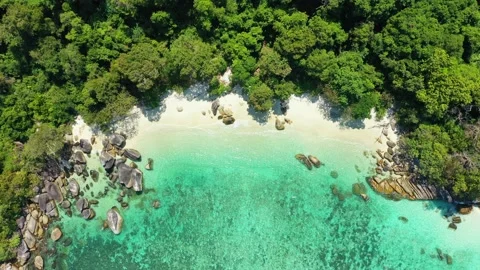 Aerial view of the ocean waves, white beaches and clear blue water and beautiful Stock Footage 130662645