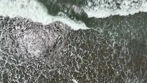 Aerial View of Ocean Waves with White Foam Stock Footage 234410294