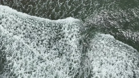 Aerial View of Ocean Waves with White Foam Stock Footage 234411287