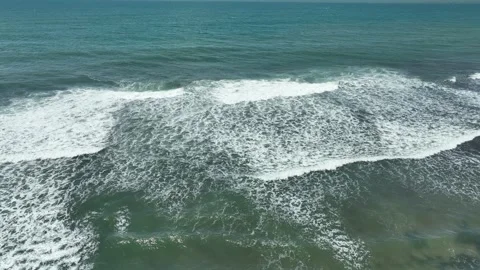 Aerial View of Ocean Waves with White Foam Stock Footage 234411989