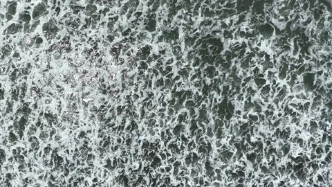 Aerial View of Ocean Waves with White Foam Stock Footage 234412130