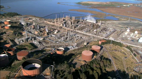 Aerial view of  oceanside oil refinery  Stock Footage