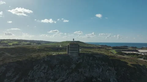 Aerial view the Odeon German WWII observation tower on Alderney, Channel Islands Vidéo 338404083