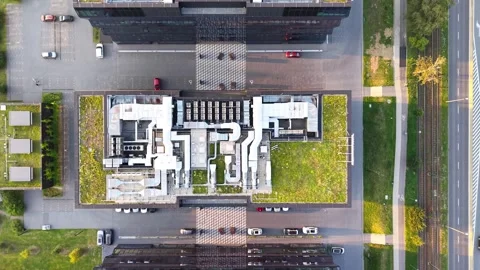 Aerial view of office building rooftop showcasing intricate ventilation systems Stock Footage 341397329