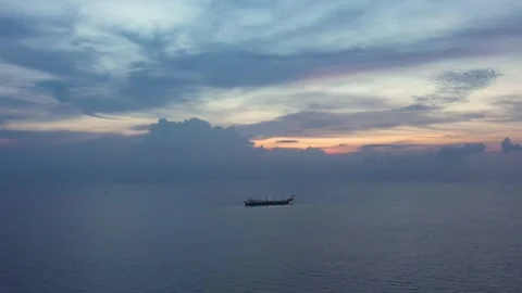 Aerial view of offshore jack up rig and offshore platform during sunset Stock Footage 320587147