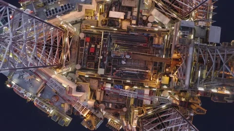 Aerial view of offshore jack up rig and offshore platform during sunset Stock Footage 320587725