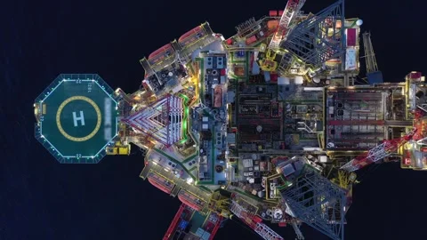 Aerial view of offshore jack up rig and offshore platform during sunset Stock Footage 320656376