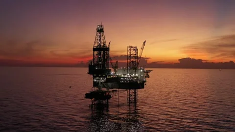 Aerial view of offshore jack up rig and offshore platform during sunset Video stock 321033760