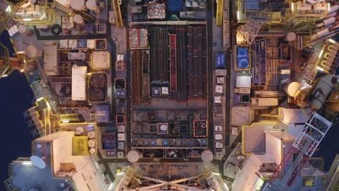 Aerial view of offshore jack up rig and offshore platform during sunset Stock Footage 323408567