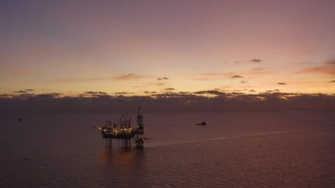 Aerial view of offshore jack up rig and offshore platform during sunset Stock Footage 327357751
