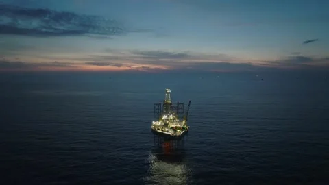 Aerial view of offshore jack up rig and offshore platform during sunset Stock Footage 333076623
