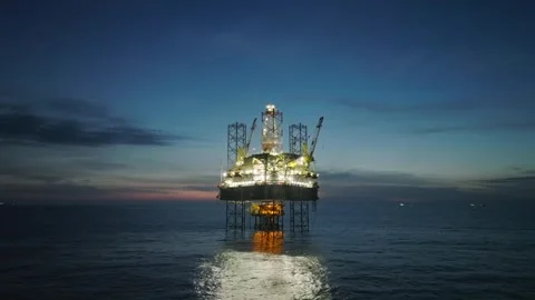 Aerial view of offshore jack up rig and offshore platform during sunset Stock Footage 333076629