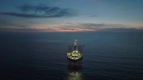Aerial view of offshore jack up rig and offshore platform during sunset Stock Footage 333076630
