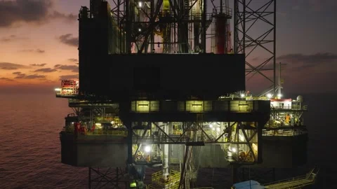 Aerial view of offshore jack up rig and offshore platform during sunset Stock Footage 336342787