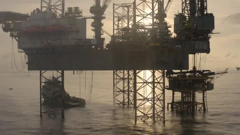 Aerial view of offshore jack up rig and offshore platform during sunset 動画素材 337673022
