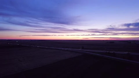 Aerial view of Ohio fields and highway i-80 during sunset Stock Footage 223070597