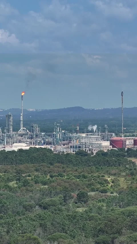 Aerial view of oil refinery complex in operation amidst energy infrastructure Stock Footage 339730760