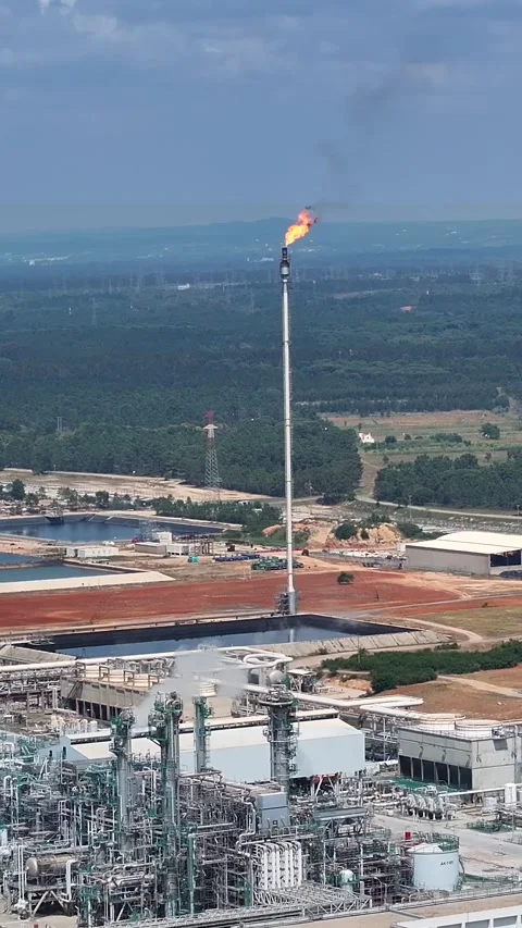Aerial view of an oil refinery complex with industrial processing activities Stock Footage 339731126