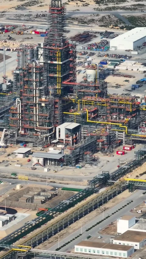 Aerial view of oil refinery complex with storage tanks and processing plant Stock Footage 339732068