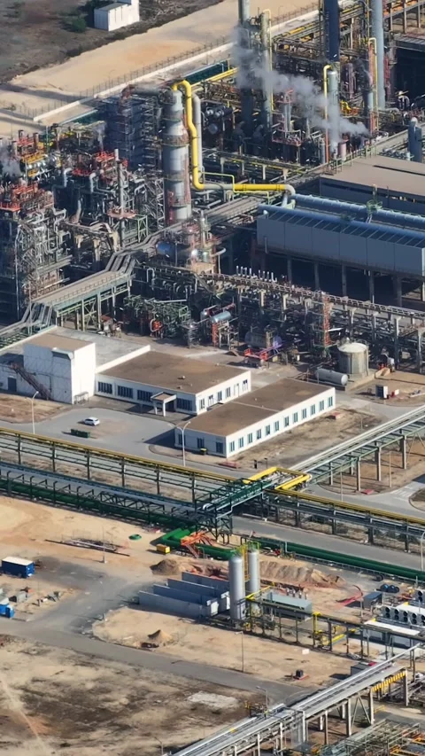 Aerial view of oil refinery complex with processing and storage operations Stock Footage 339732351