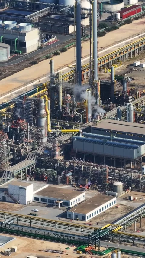 Aerial view of oil refinery complex and fuel storage tanks in industrial area Stock Footage 339732381