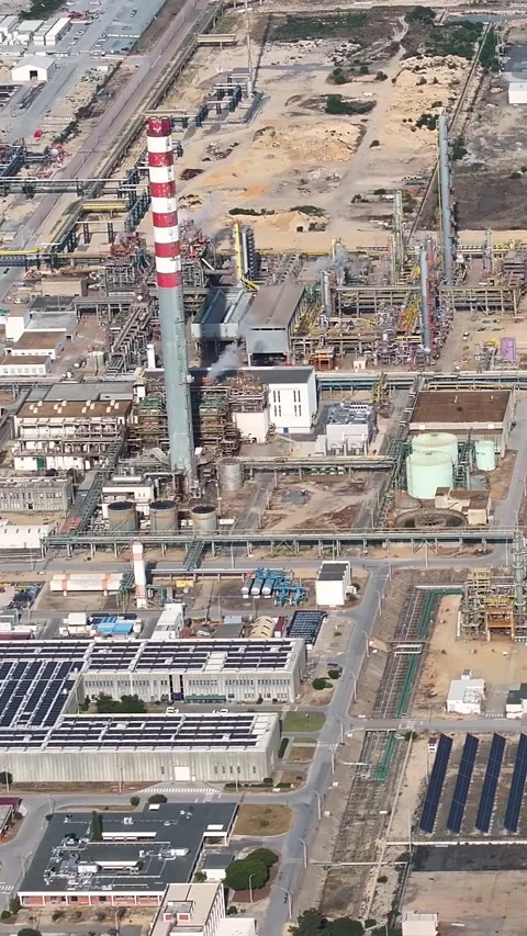 Aerial view of oil refinery complex with storage tanks and processing units Stock Footage 339732808