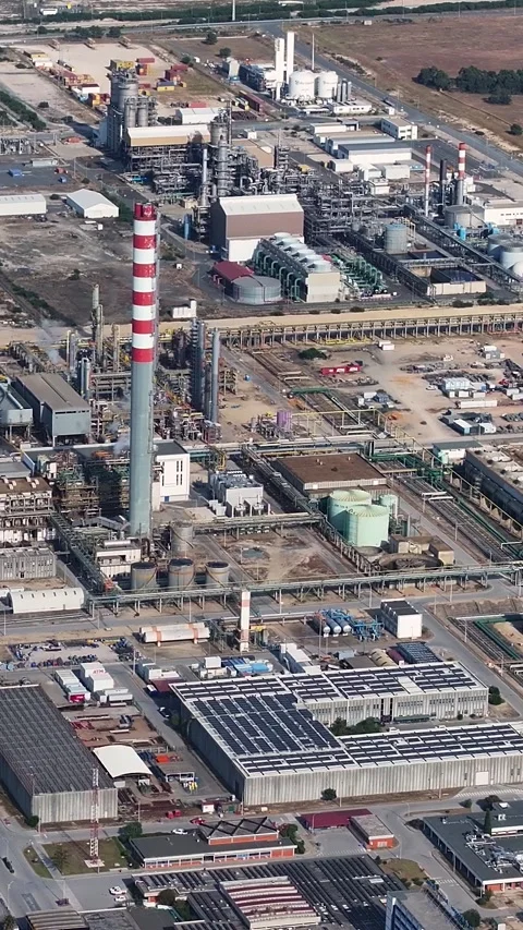 Aerial view of oil refinery complex in industrial processing plant layout Stock Footage 340906790