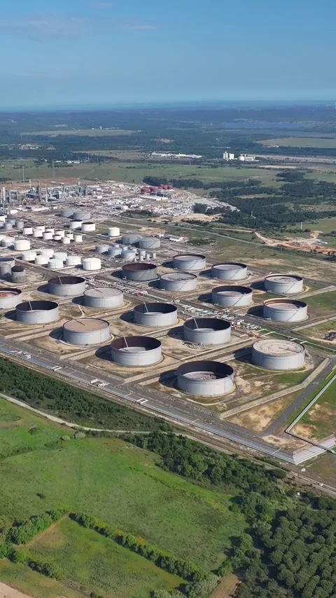 Aerial view of oil refinery complex with storage tanks and processing facilities Stock Footage 340908232