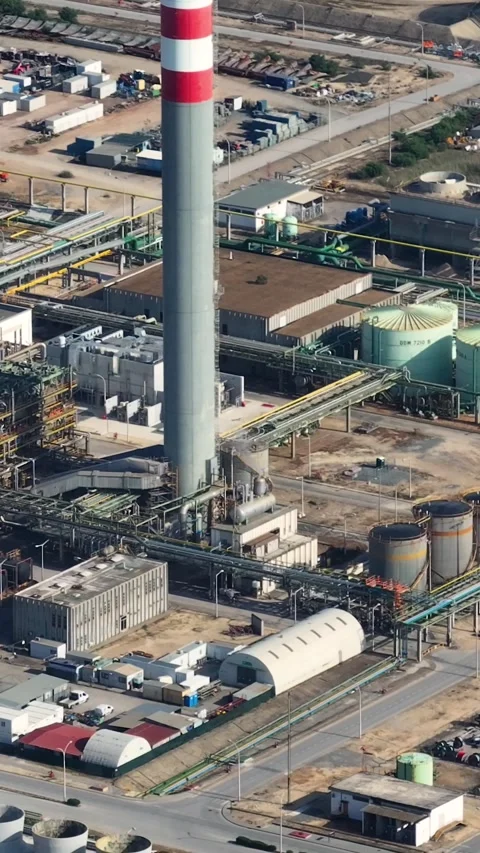 Aerial view of an oil refinery complex in an industrial area Stock Footage 340908251