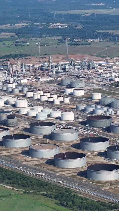 Aerial view of oil refinery complex with storage tanks and processing units Stock Footage 341333220