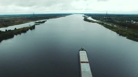 Aerial view of oil tanker ship sailing on river Stock Footage