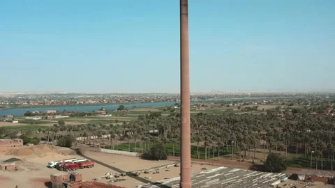 Aerial view of Old big pipe or chimney  in the city. Old brick factory. Stock-Footage 154972211