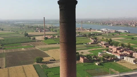 Aerial view of Old big pipe or chimney  in the city. Old brick factory. Stock-Footage 154972264
